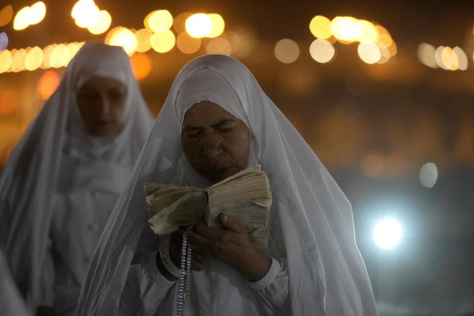 Muslim pilgrims pray on the Plain of Arafat, during the annual hajj pilgrimage, near the holy city of Mecca, Saudi Arabia, Friday, July 8, 2022. (AP Photo/Amr Nabil)