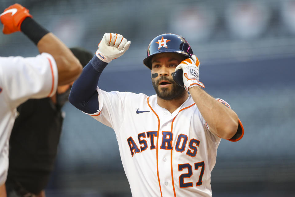 SAN DIEGO, CA - OCTOBER 13:  Jose Altuve #27 of the Houston Astros celebrates after hitting a solo home run in the first inning during Game 3 of the ALCS between the Tampa Bay Rays and the Houston Astros at Petco Park on Tuesday, October 13, 2020 in San Diego, California. (Photo by Alex Trautwig/MLB Photos via Getty Images)