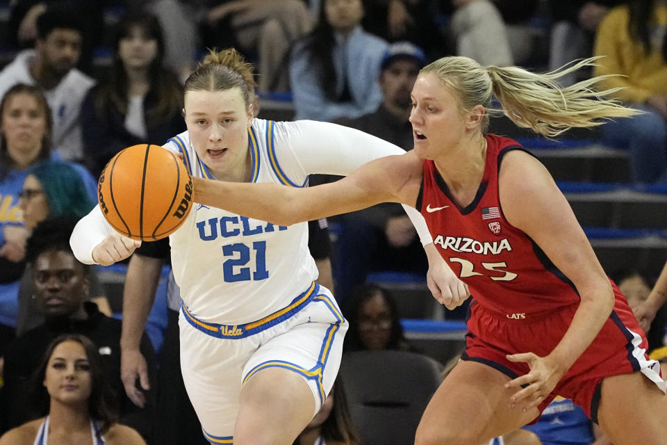 UCLA forward Lina Sontag, left, and Arizona forward Cate Reese go after a loose ball during the second half of an NCAA college basketball game Friday, Feb. 3, 2023, in Los Angeles. (AP Photo/Mark J. Terrill)