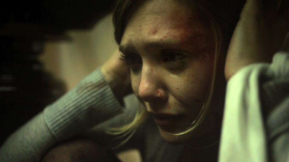 In this film image released by Open Road Films, Elizabeth Olsen is shown in a scene from "Silent House." (AP Photo/Open Road Films)