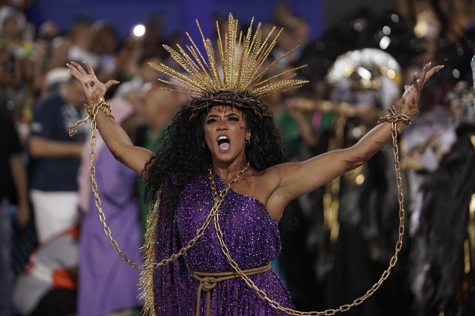 Drum queen Evelyn Bastos from the Mangueira samba school performs during Carnival celebrations at the Sambadrome in Rio de Janeiro, Brazil, Monday, Feb. 24, 2020. (AP Photo/Leo Correa)