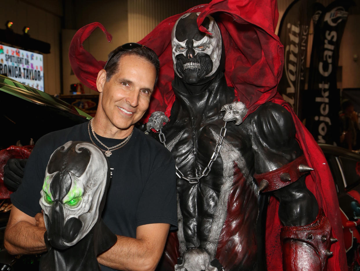 LAS VEGAS, NV - JUNE 23: Image Comics Co-founder  Todd McFarlane (L) and Tom Proprofsky, dressed as the character Spawn from the 