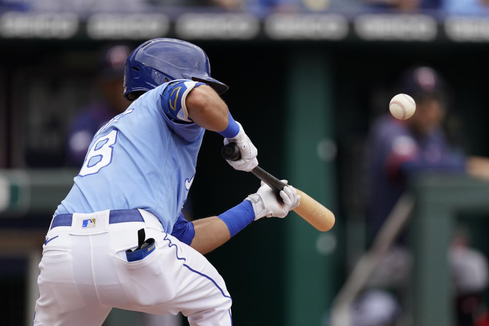 Kansas City Royals' Nicky Lopez bunts into a triple play during the third inning of a baseball game against the Minnesota Twins Sunday, June 6, 2021, in Kansas City, Mo. (AP Photo/Charlie Riedel)