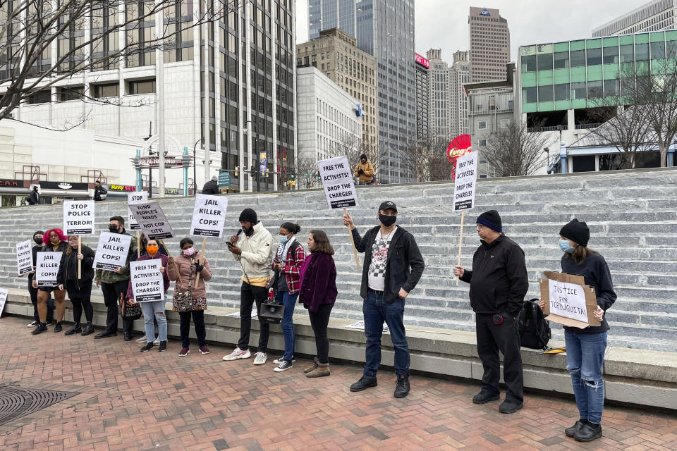 Demonstrators protest the death of an environmental activist, who went by Tortuguita, in Atlanta on Saturday, Jan. 21, 2023. Tortuguita was killed Wednesday, Jan. 18, after authorities said the 26-year-old shot a state trooper. Activists have questioned officials’ version of events, demanding an independent investigation. (AP Photo/R.J. Rico)