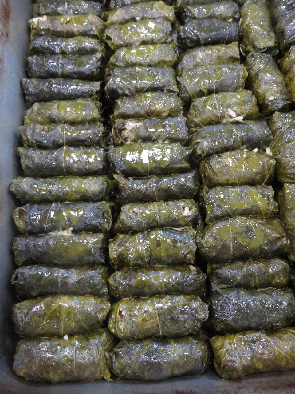 Dolmathes (stuffed grape leaves) are readied for the Greek Festival.