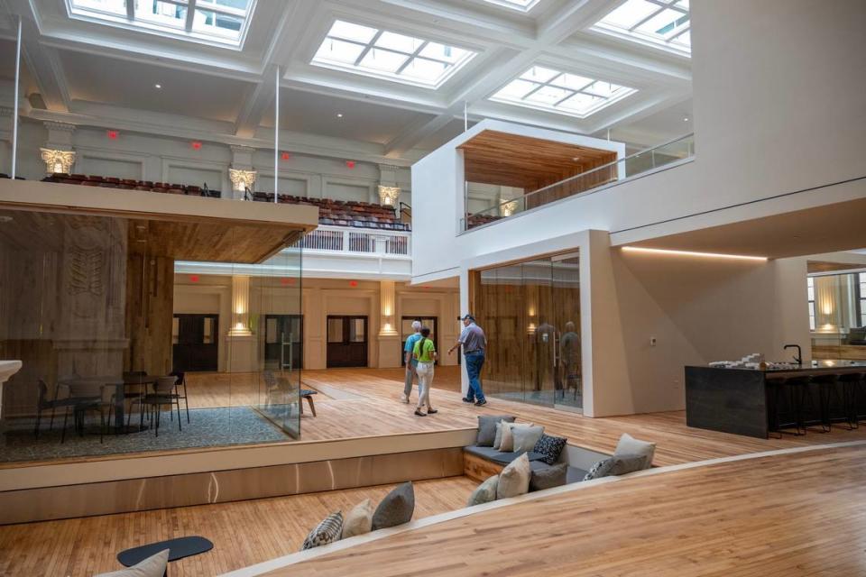 Guests tour the renovated Westport High School auditorium at The Residences at Park 39 on Thursday, May 9, 2024, in Kansas City.