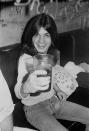 <p>AC/DC guitarist, Malcolm Young, enjoying a drink backstage after a performance at the Marquee Club. </p>