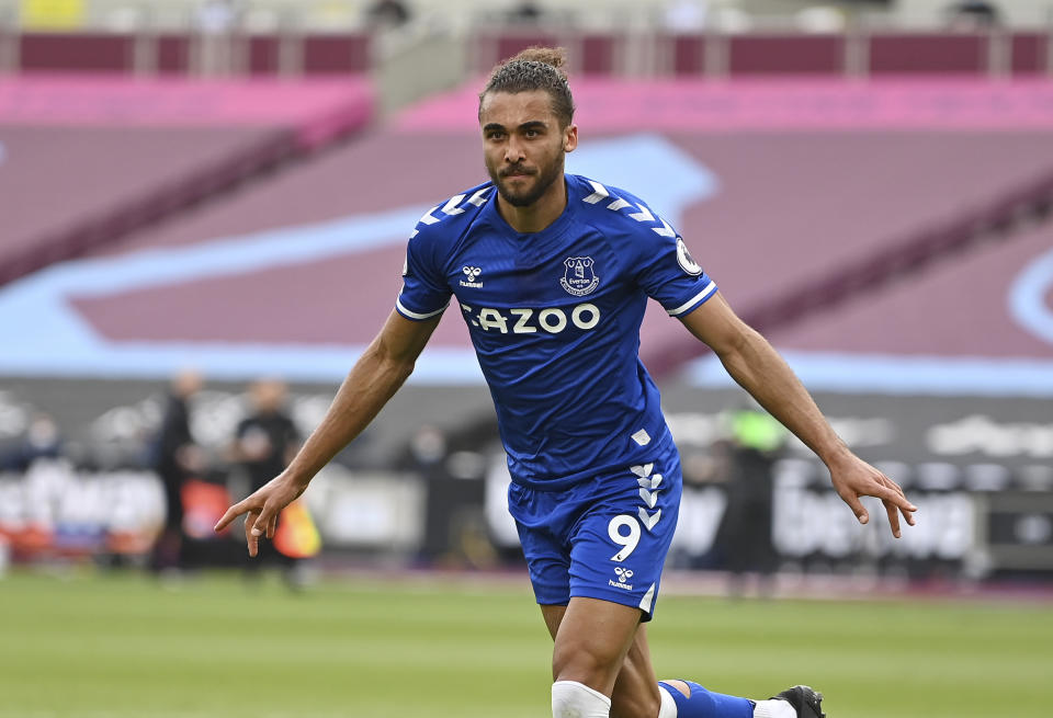 Everton's Dominic Calvert-Lewin celebrates after scoring his side's opening goal during the English Premier League soccer match between West Ham United and Everton at London stadium in London, England, Sunday, May 9, 2021. (Justin Setterfield, Pool via AP)