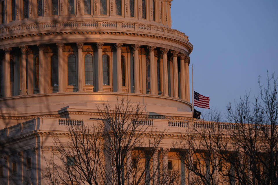 The American flag at the U.S. Capitol flies at half-staff in honor of Capitol Police officer William Evans who was killed after a man rammed a car into two officers at a barricade outside the U.S. Capitol in Washington, Friday, April 2, 2021. (AP Photo/Alex Brandon)