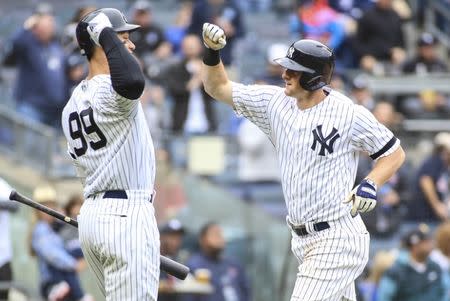 Apr 20, 2019; Bronx, NY, USA; New York Yankees center fielder Mike Tauchman (39) is greeted by right fielder Aaron Judge (99) after hitting a three run home run in the fourth inning against the Kansas City Royals at Yankee Stadium. Mandatory Credit: Wendell Cruz-USA TODAY Sports