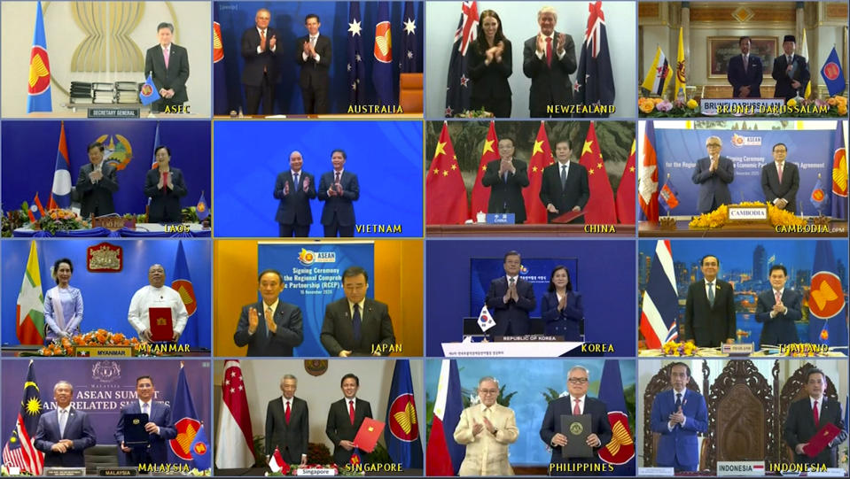 This image made from a teleconference provided by the Vietnam News Agency (VNA) shows the leaders and trade ministers of 15 Regional Comprehensive Economic Partnership (RCEP) countries pose for a virtual group photo in Hanoi, Vietnam on Sunday, Nov. 15, 2020. China and 14 other countries have agreed to set up the world’s largest trading bloc, encompassing nearly a third of all economic activity, in a deal many in Asia are hoping will help hasten a recovery from the shocks of the pandemic. (VNA via AP)