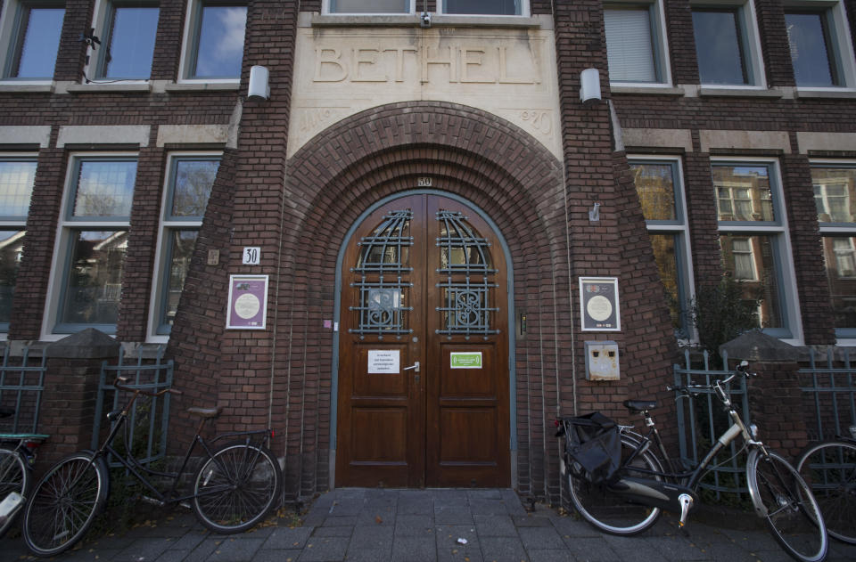 Exterior view of the Bethel church in The Hague, Netherlands, Friday, Nov. 30, 2018, where for more than a month, a rotating roster of preachers and visitors has been leading a non-stop, round-the-clock service at a small Protestant chapel in a quiet residential street in The Hague in an attempt to prevent the deportation of a family of Armenian asylum seekers. (AP Photo/Peter Dejong)