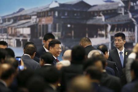 China's President Xi Jinping attends the opening ceremony of the second World Internet Conference in Wuzhen town of Jiaxing, Zhejiang province, China, December 16, 2015. REUTERS/Aly Song