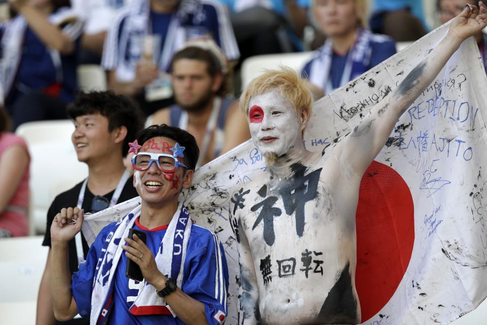 <p>Japanese fans wait for the start of the group H match between Japan and Poland </p>