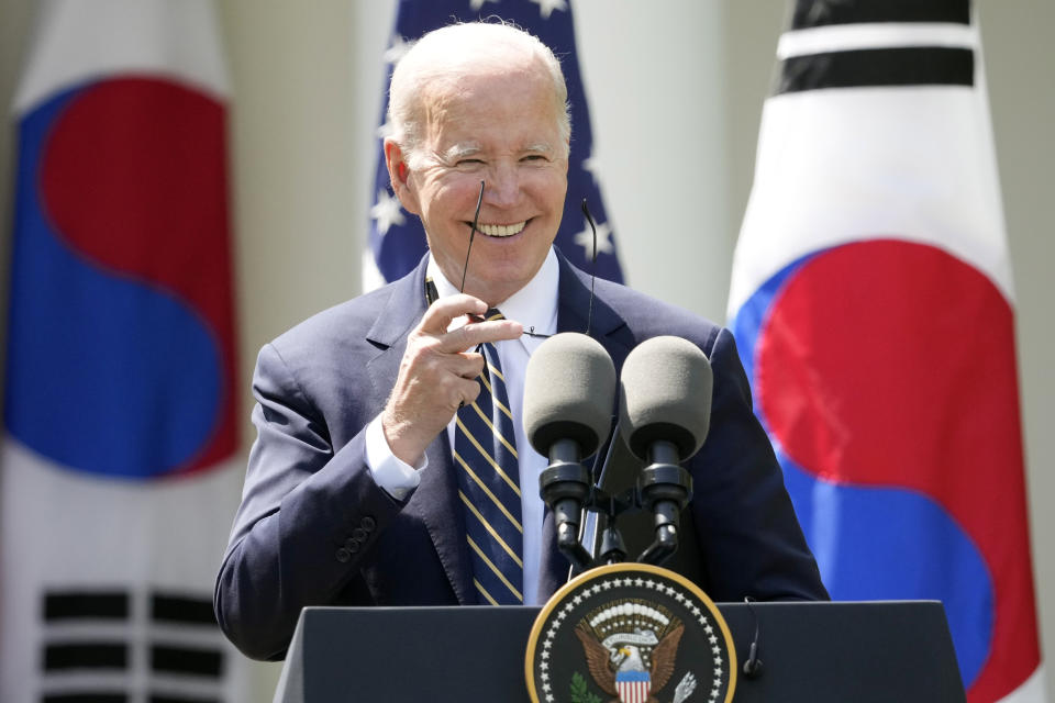 President Joe Biden takes his sunglasses off at a news conference with South Korea's President Yoon Suk Yeol in the Rose Garden of the White House Wednesday, April 26, 2023, in Washington. (AP Photo/Andrew Harnik)