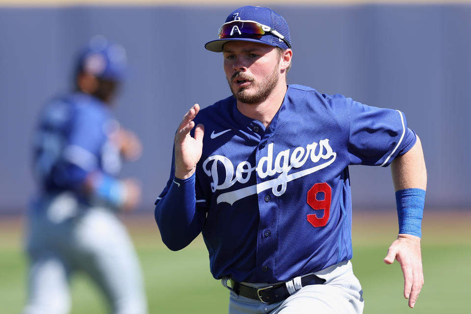 PEORIA, ARIZONA - FEBRUARY 27: Gavin Lux #9 of the Los Angeles Dodgers warms up before the spring training game against the San Diego Padres at Peoria Stadium on February 27, 2023 in Peoria, Arizona. (Photo by Christian Petersen/Getty Images)