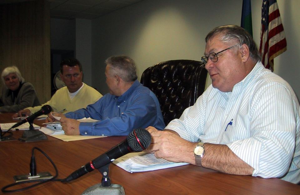 Bob Kovach, right, attends his first meeting as county commissioner on April 10, 2007. Kovach, a Democrat, was picked to replace Cindy Bodle as the 3rd District commissioner. Bodle resigned to become the chief deputy auditor for the county. In the background, from left, are attorney Kathleen Cekanski-Farrand and Commissioners Mark Dobson and Steve Ross. Kovach, a former mayor of Mishawaka, died Nov. 20, 2022, after an illness.