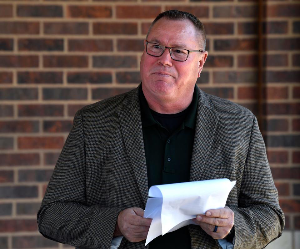 Jay Strong, who served with Anthony Martin in the Air Force, delivers an emotional eulogy for Martin Tuesday at Abilene's Texas State Veterans Cemetery. Martin, an Austin motorcycle police officer, died in a traffic accident Sept. 23.