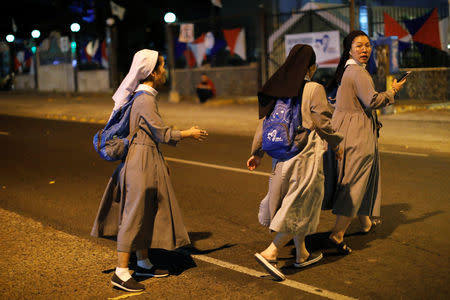 A group of nuns are seen on the street, ahead of Pope Francis' visit in Panama City, Panama January 21, 2019. REUTERS/Carlos Jasso