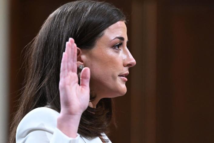 Cassidy Hutchinson, an aide to then White House chief of staff Mark Meadows, is sworn-in
