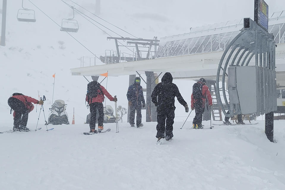 Rescues crews work at the scene of an avalanche at the Palisades Tahoe ski resort on Wednesday, Jan. 10, 2024, near Lake Tahoe, Calif. The avalanche roared through a section of expert trails at the ski resort as a major storm with snow and gusty winds moved into the region, authorities said. (Mark Sponsler via AP)