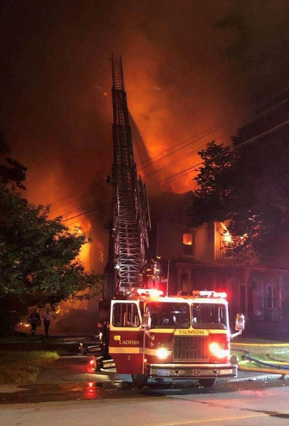 Picture of Taunton Fire Department ladder truck in action during a blaze on Harrison St. August 2019.