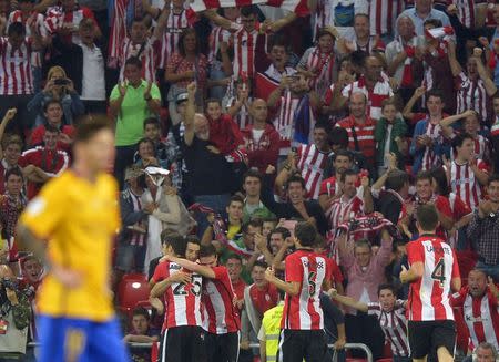 Athletic Bilbao players celebrate a goal during their Spanish Super Cup first leg soccer match against Barcelona at San Mames stadium in Bilbao, northern Spain, August 14, 2015. REUTERS/Vincent West