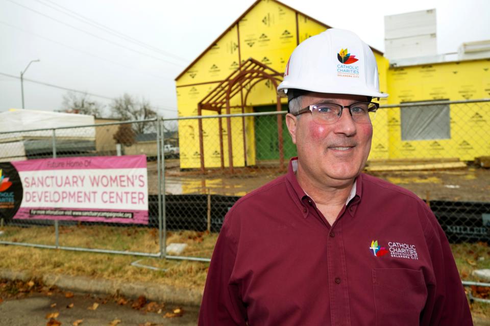 Catholic Charities director Patrick Raglow is shown in front of construction of the Sanctuary Women's Development Center. The sanctuary will expand assistance to homeless and at-risk women. The expansion will include showers, laundry facilities, a computer lab, safe room and case management. Plans also include nearby affordable housing.