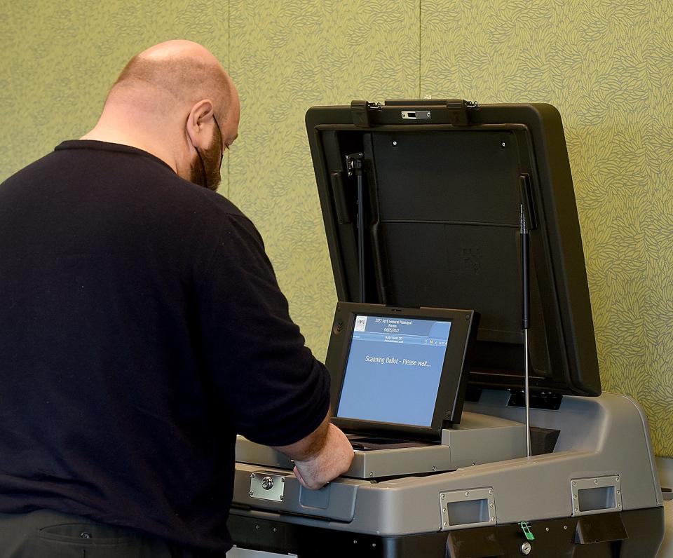 Columbia resident Mark Jones places his ballot into a counting machine April 5, 2022 at the Columbia Public Library. The Columbia City Council this week discussed street and public safety projects that could be included in a 1/4-cent capital improvement sales tax renewal ballot measure in August.