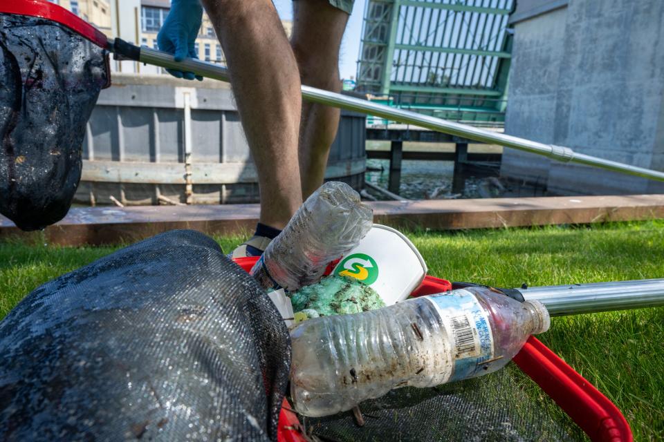 Recovered plastic from the Manitowoc River just upstream from Lake Michigan is shown Monday, June 12, 2023 Manitowoc, Wis. The plastics were being collected for a study on plastics in the lake.