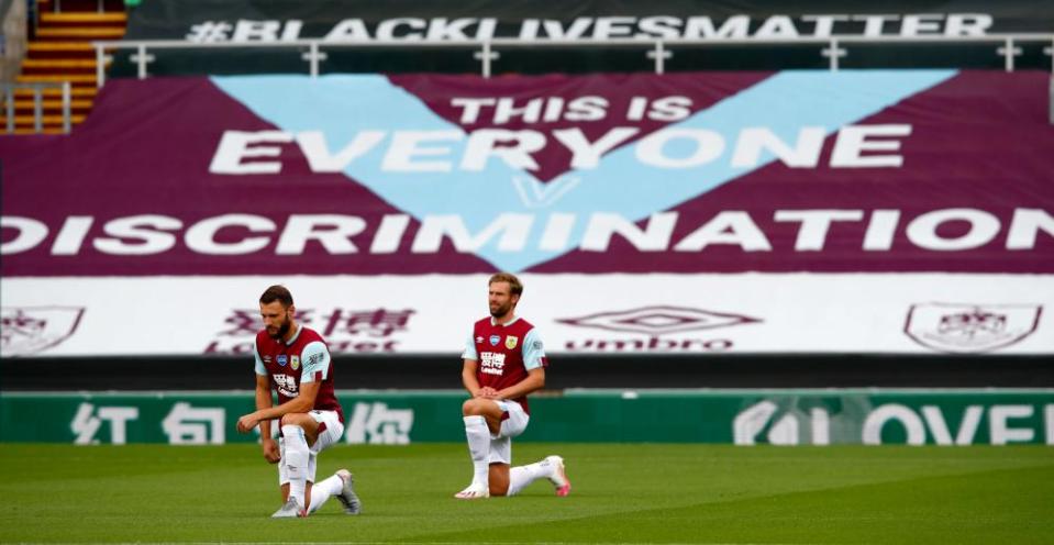 Banners on display at Turf Moor in July.