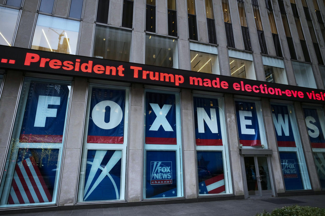 FILE - A headline about President Donald Trump is displayed outside Fox News studios in New York on Nov. 28, 2018. Documents in defamation lawsuit illustrate pressures faced by Fox News journalists in the weeks after the 2020 presidential election. The network was on a collision course between giving its conservative audience what it wanted and reporting uncomfortable truths about then-President Donald Trump and his false fraud claims. (AP Photo/Mark Lennihan, File)