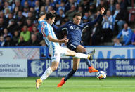 <p>Tottenham’s Dele Alli in action with Huddersfield Town’s Christopher Schindler (REUTERS/Peter Powell) </p>