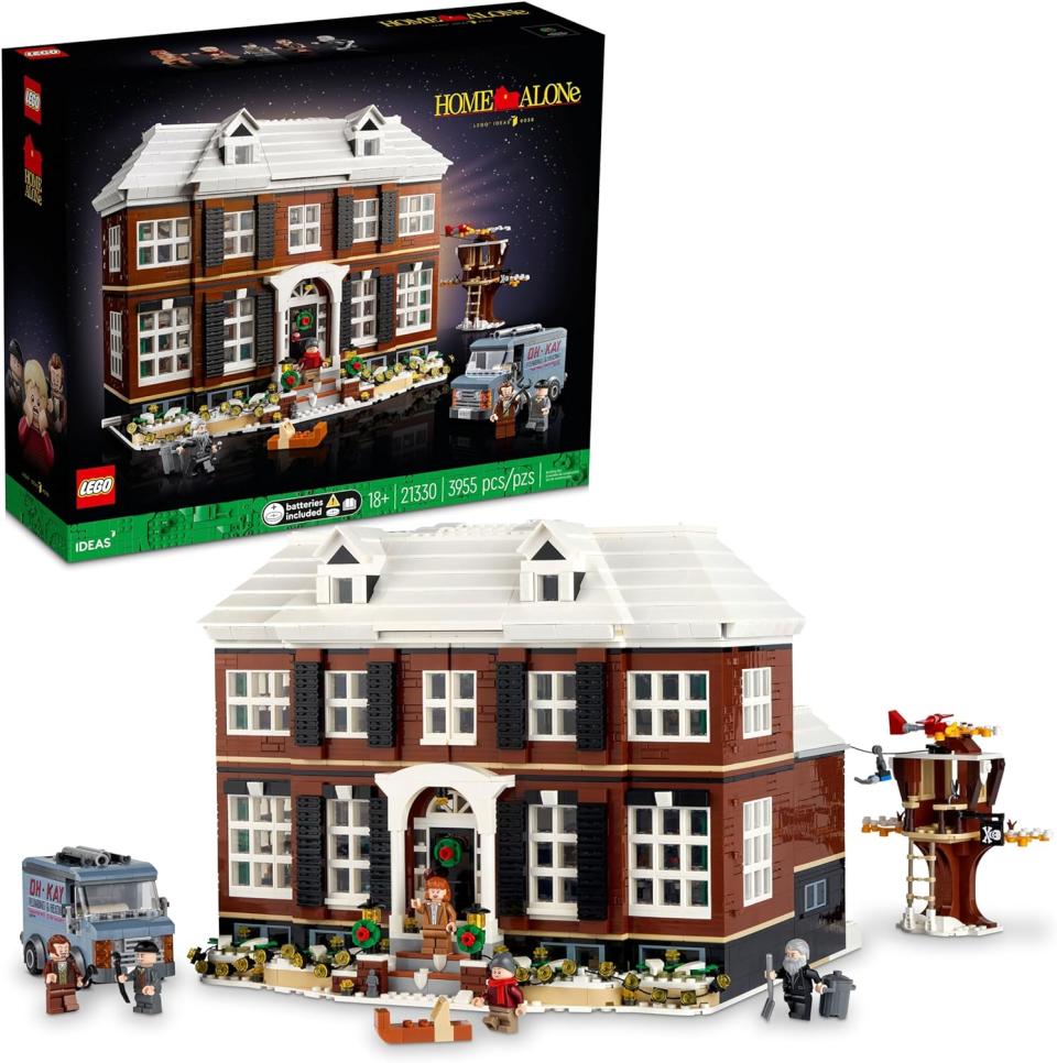 product box next to built home alone lego house