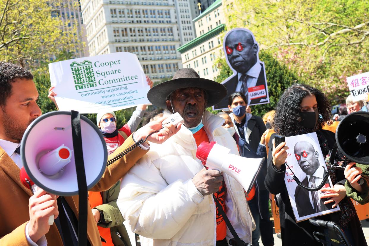 Julius Bennet, a representative for Community Action for Safe Apartments, speaks as people gather for a rally protesting rent hikes at City Hall Park in lower Manhattan, New York on April 28, 2022.