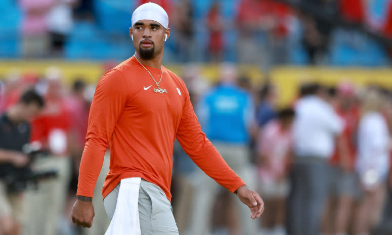 Clemson quarterback D.J. Uiagalelei warms up before a game.