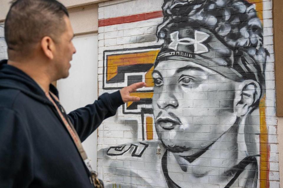 Joey Martinez, a muralist, showcases his mural featuring Kansas City Chiefs quarterback Patrick Mahomes on Tuesday, Feb. 6, 2024, in Lubbock, Texas.