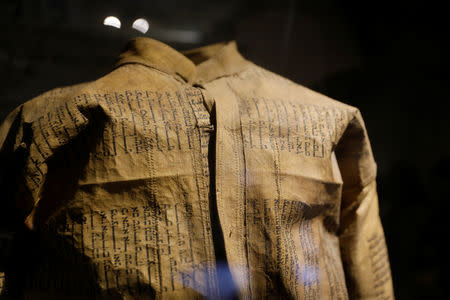 A jacket the Nazis had Jewish prisoners make out of Torah parchments is seen on display at "The Chamber of the Holocaust", a little-known memorial site for Jewish victims of the Nazi Holocaust, in Jerusalem's Mount Zion January 23, 2019. REUTERS/Ronen Zvulun