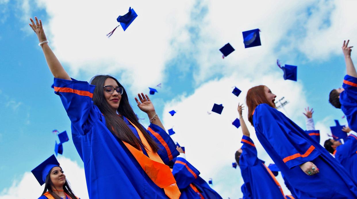 Members of the Central High School class of 2021 toss their caps in the air after the conclusion of the graduation ceremony at San Angelo Stadium on May 29, 2021. Both the Central and Lake View high school ceremonies were held that day.