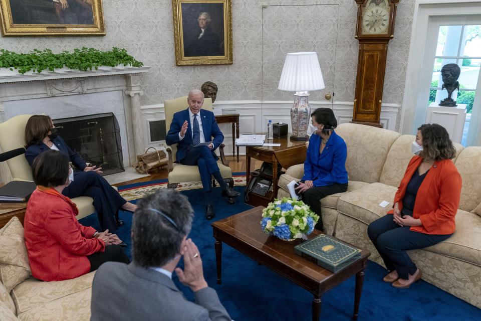 FILE - In this April 15, 2021, file photo, President Joe Biden, accompanied by from left, Vice President Kamala Harris, Sen. Mazie Hirono, D-Hawaii, Mark Takano, D-Calif., Rep. Judy Chu, D-Calif., and Rep. Grace Meng, D-N.Y., speaks during a meeting with members of the Congressional Asian Pacific American Caucus Executive Committee at the White House in Washington. The outreach to Congress is nothing new for presidents, but Biden is a veteran of Capitol Hill who knows how to tap the desire of even the most partisan legislators to legislate. (AP Photo/Andrew Harnik, File)