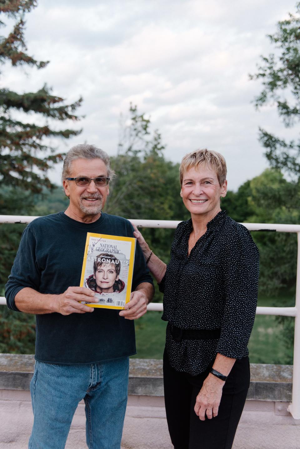 Iowa astronaut Peggy Whitson poses with attendees to Capital City Pride's Fireside Chat event at the Drake Municipal Observatory on Sept. 22, 2023.