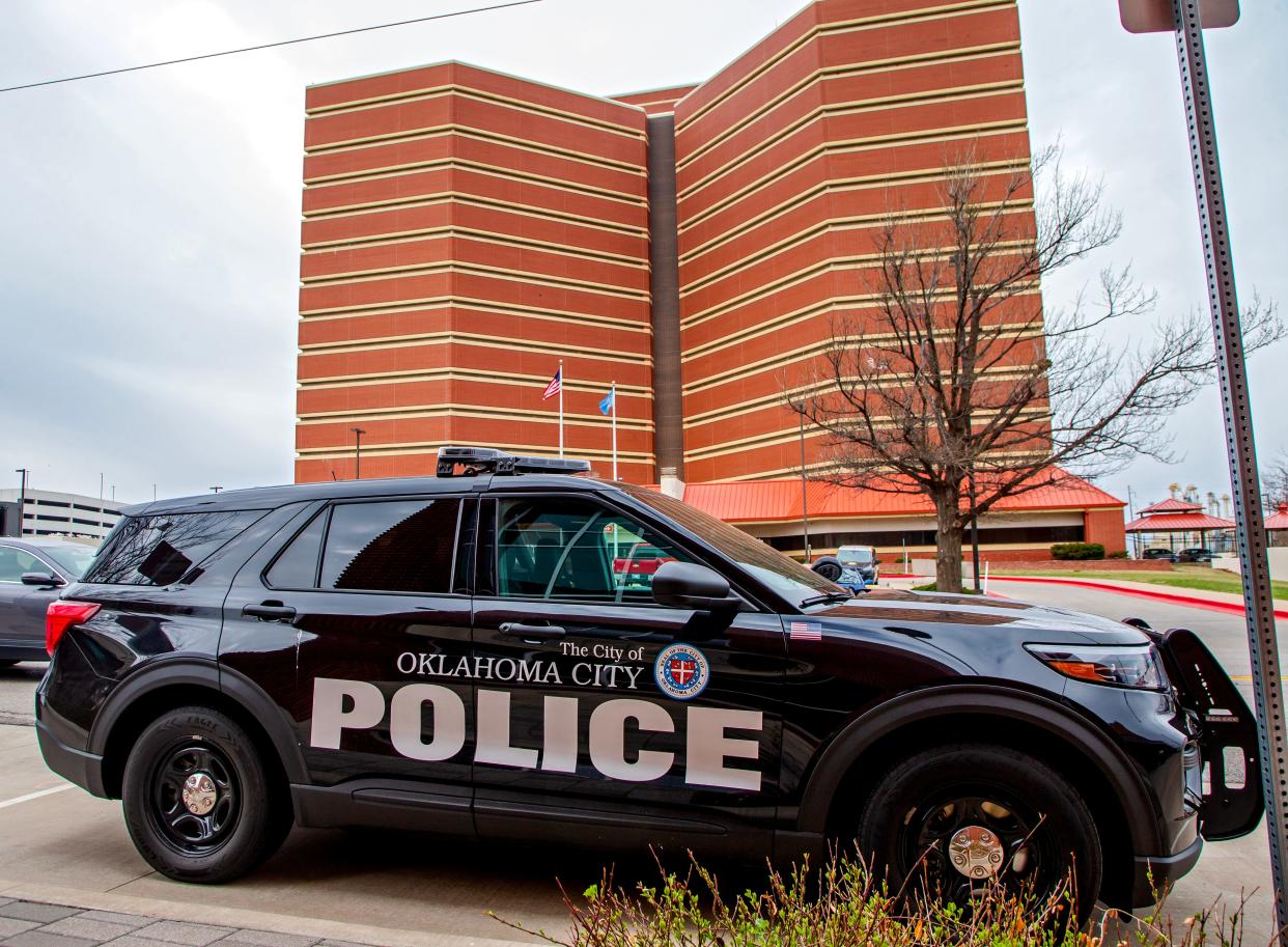 An Oklahoma City Police Department vehicle is pictured March 13, 2013, parked along Shartel Avenue in front of the Oklahoma County jail. The county is using a recently completed jail costs study as a starting point for new negotiations with Oklahoma City.