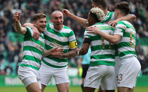 James Forrest celebrates after completing his hat-trick - Credit: PA