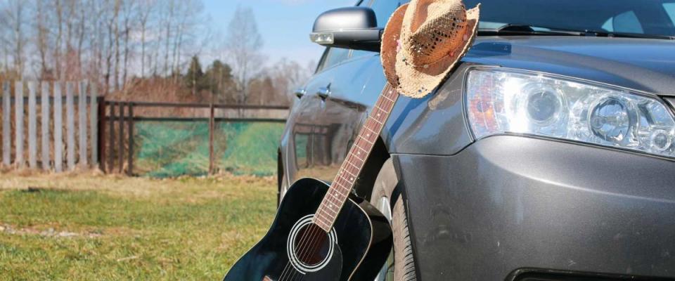 guitar outdoor near car