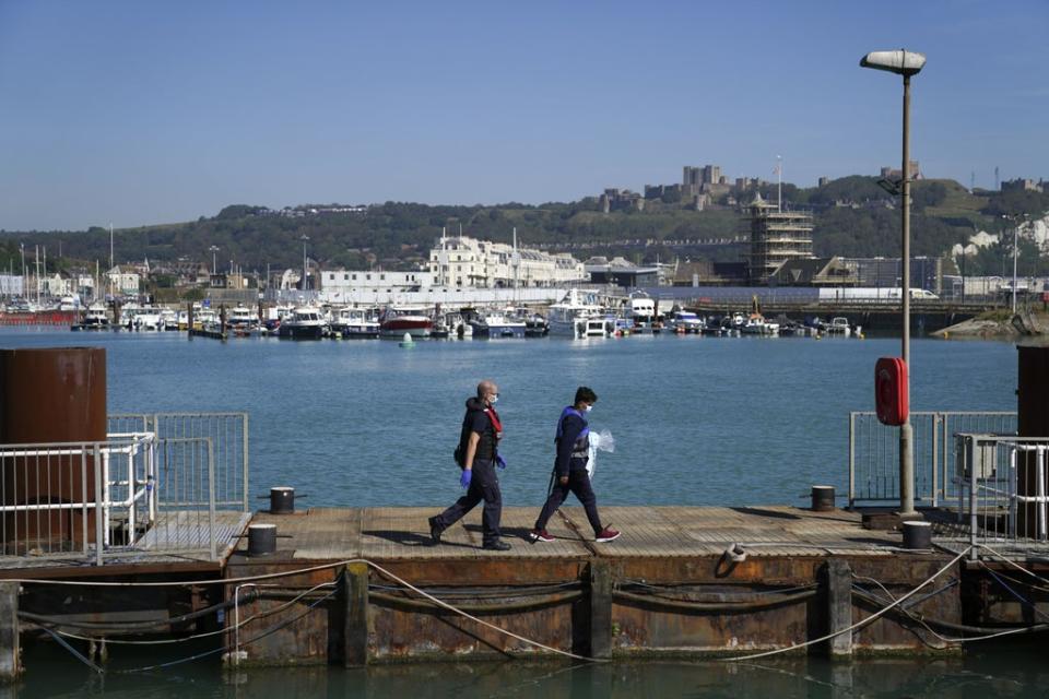 A person thought to be a migrant is brought into Dover, Kent, following a small boat incident in the Channel (Steve Parsons/PA) (PA Wire)