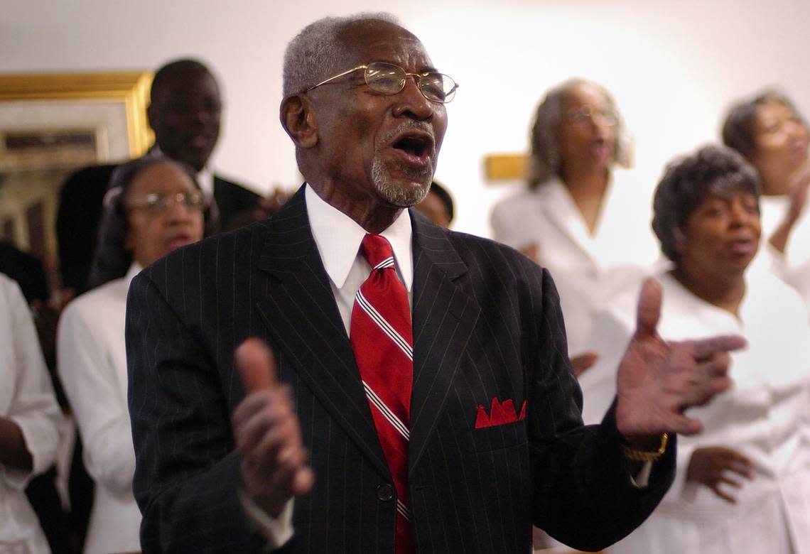 Bishop Walter H. Richardson, center, joins the Tabernacle Gospel Inspirational Choir in a song during a Sunday morning service at The Church of God Tabernacle in Liberty City, Florida, on Sunday, May 20, 2007.