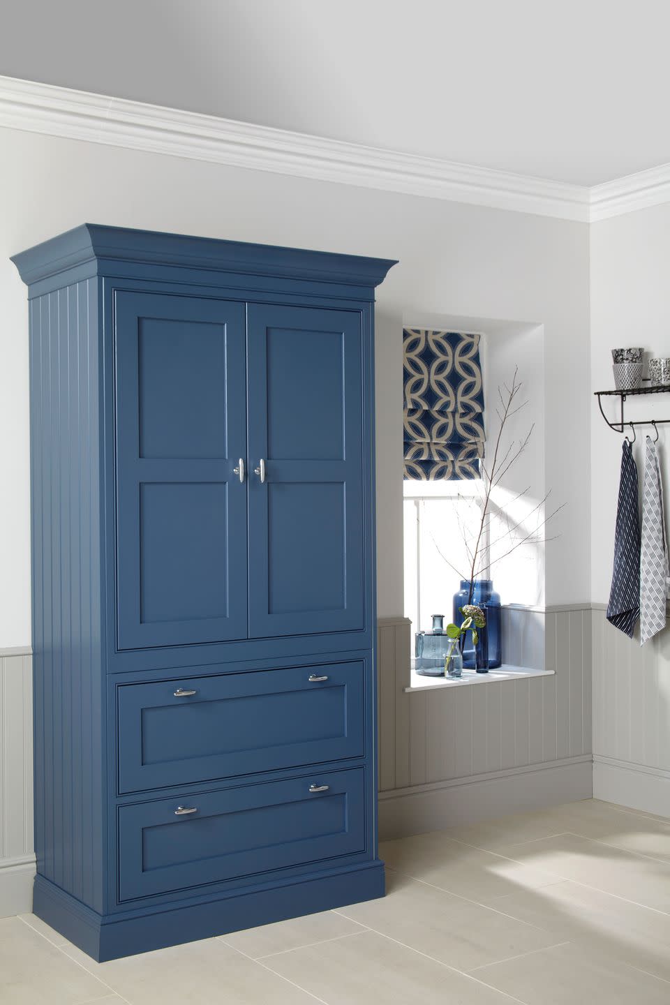 <p>We love this navy blue free-standing kitchen larder unit that brings in a pop of colour. to a neutral space 'The trend for dark colours in the kitchen reflects the need for a space in which to entertain friends and family. These darker colours tend to work well for those who enjoy hosting dinner parties or drinks gatherings and are looking for a more luxurious finish in their kitchen,' explains Doug Haswell, furniture manager at Caple Kitchens. <strong><br></strong></p><p><strong>SEE MORE: </strong><a href="https://www.housebeautiful.com/uk/renovate/a20197403/kitchen-features-add-most-value-property/" rel="nofollow noopener" target="_blank" data-ylk="slk:8 kitchen features that will add the most value to your home;elm:context_link;itc:0;sec:content-canvas" class="link ">8 kitchen features that will add the most value to your home</a></p><p>• Shop the look at <a href="https://www.caple.co.uk/products/kitchens/" rel="nofollow noopener" target="_blank" data-ylk="slk:Caple Kitchens;elm:context_link;itc:0;sec:content-canvas" class="link ">Caple Kitchens </a></p>