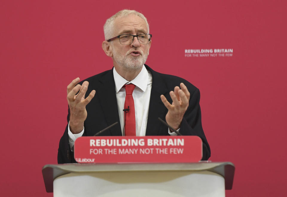 Britain's main opposition Labour Party leader Jeremy Corbyn makes a speech during a visit to Pen Green Children's Centre in Corby, England, Monday Aug. 19, 2019. British Prime Minister Boris Johnson is under increasing pressure to recall Parliament after leaked government documents warned of widespread problems if the U.K. leaves the European Union without a Brexit withdrawal agreement. (Joe Giddens/PA via AP)