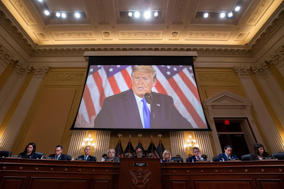 Former US President Donald Trump is displayed on a screen Monday, Dec. 19, 2022, during a hearing of the Select Committee to Investigate the January 6th Attack on the US Capitol in Washington, D.C.