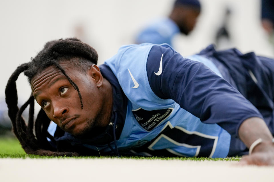 Tennessee Titans wide receiver DeAndre Hopkins stretches during NFL football practice Tuesday, June 4, 2024, in Nashville, Tenn. (AP Photo/George Walker IV)